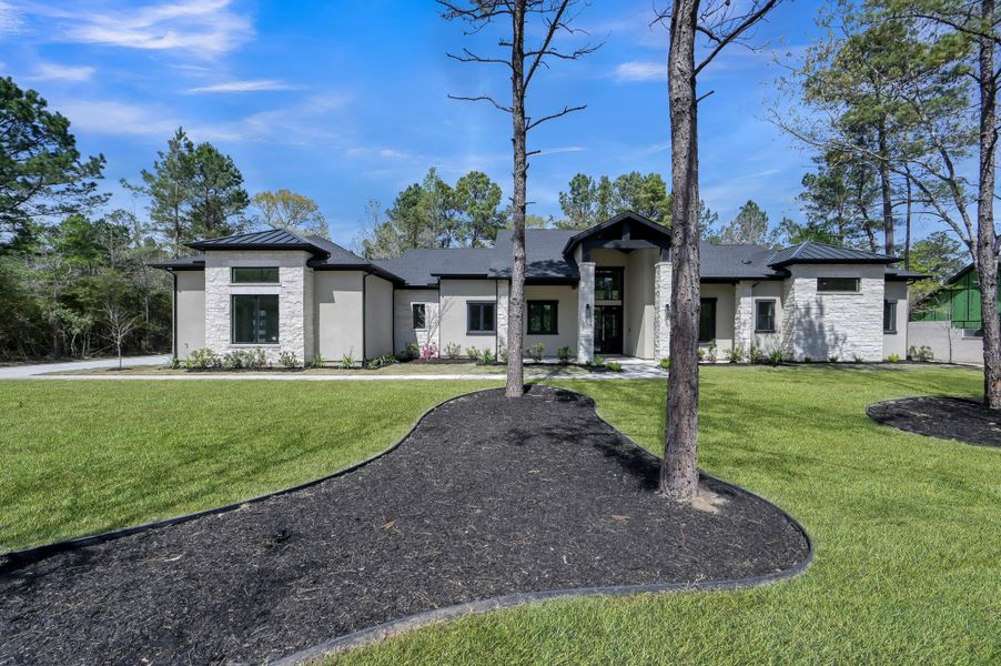 Surrounded by natural beauty and open space, the property offers a rare sense of privacy and tranquility—capturing the essence of elevated acreage living.