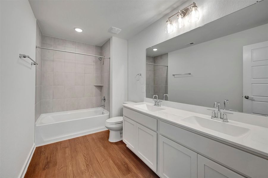 Furnished interior view inside a new home in Sorella, Tomball (Image 8).