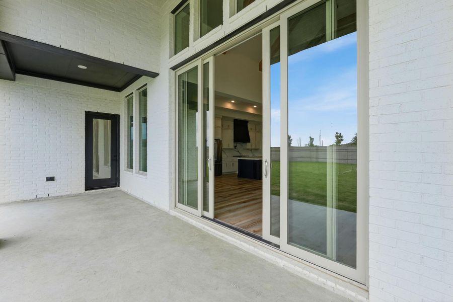 Covered porch and large backyard