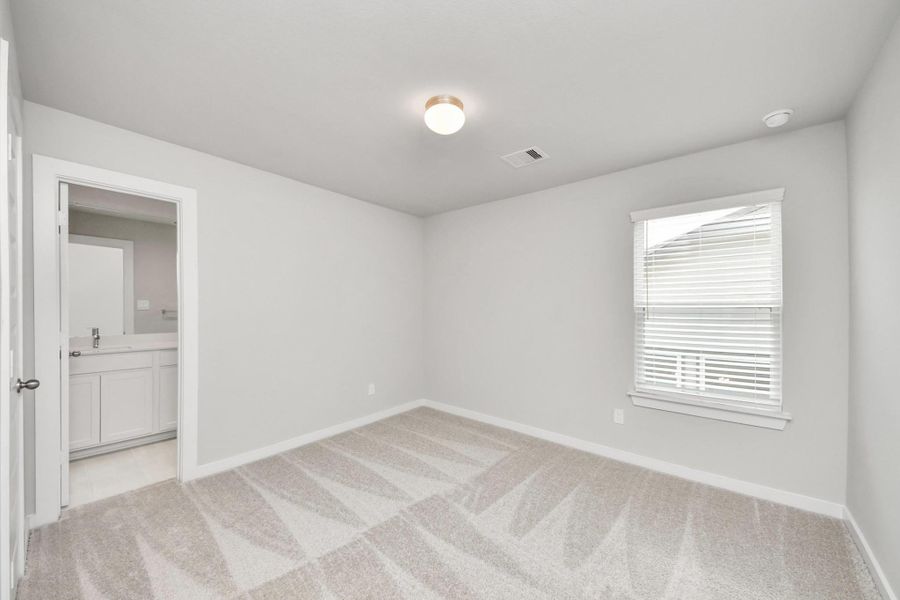 Generously sized secondary bedrooms featuring spacious closets, soft and inviting carpeting underfoot, large windows allowing plenty of natural light, and the added touch of privacy blinds for your personal retreat. Sample photo of completed home with similar floor plan. Actual colors and selections may vary. Generously sized secondary bedrooms featuring spacious closets, soft and inviting carpeting underfoot, large windows allowing plenty of natural light, and the added touch of privacy blinds for your personal retreat. Sample photo of completed home with similar floor plan. Actual colors and selections may vary.