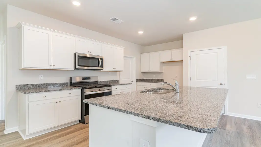 Representative furnished interior of a home built from the ROBIE by D.R. Horton in Sandridge Park, Little River (Image 4).