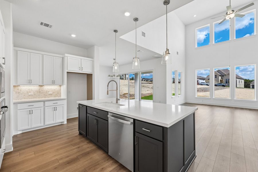 Representative furnished interior of a home built from the Rainey by Taylor Morrison in Santa Rita Ranch, Liberty Hill (Image 7).