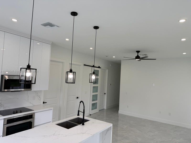 Furnished interior view inside a new home in , Lehigh Acres (Image 4).