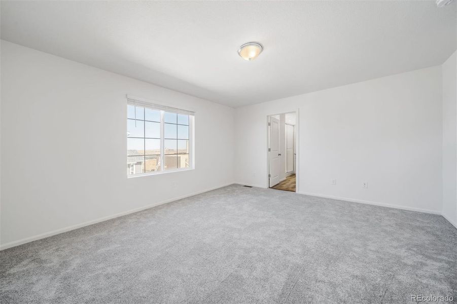 Spacious, unfurnished interior of a new home in Reunion, Commerce City (Image 18).