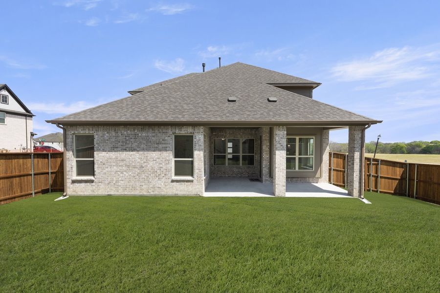 Exterior details and patio area of a home in Providence Cove, McKinney (Image 4). Exterior details and patio area of a home in Providence Cove, McKinney (Image 4).