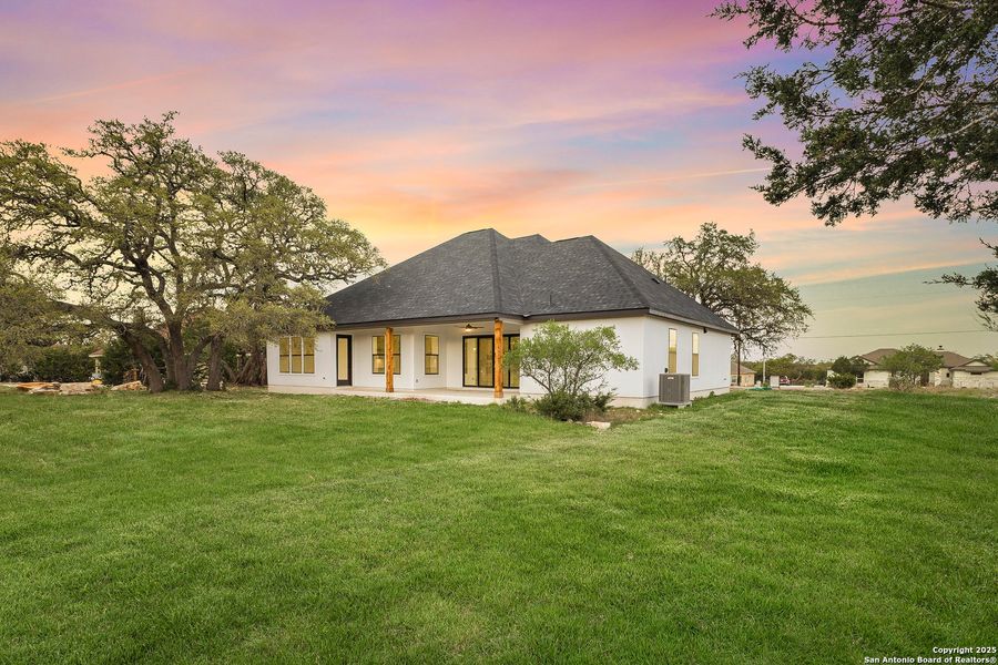 Exterior details and patio area of a home in , Spring Branch (Image 21).