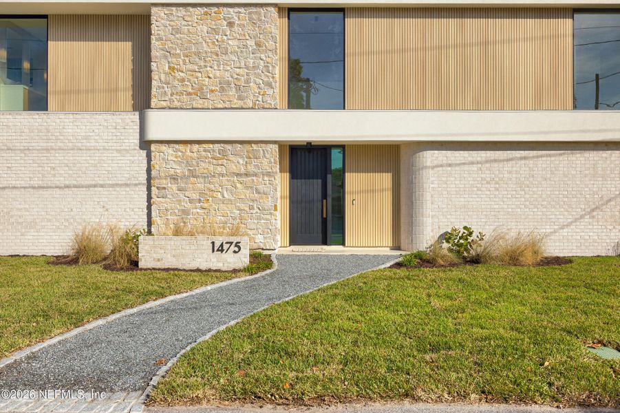 Exterior details and patio area of a home in , Atlantic Beach (Image 3).