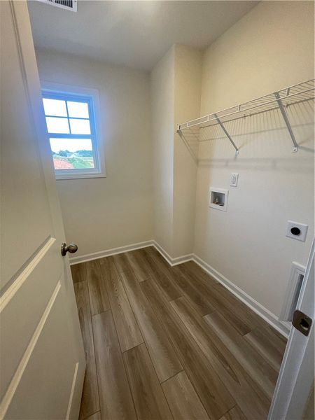 Spacious, unfurnished interior of a new home in Springwood Grove, Central (Image 27).