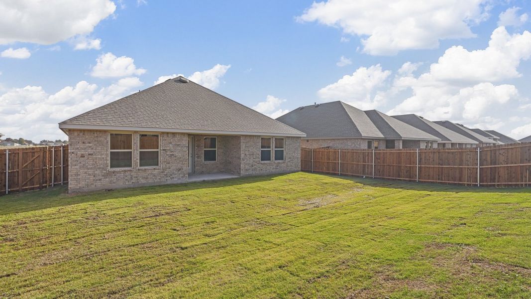 Exterior details and patio area of a home in Trailstone, Caddo Mills (Image 4). Exterior details and patio area of a home in Trailstone, Caddo Mills (Image 4).