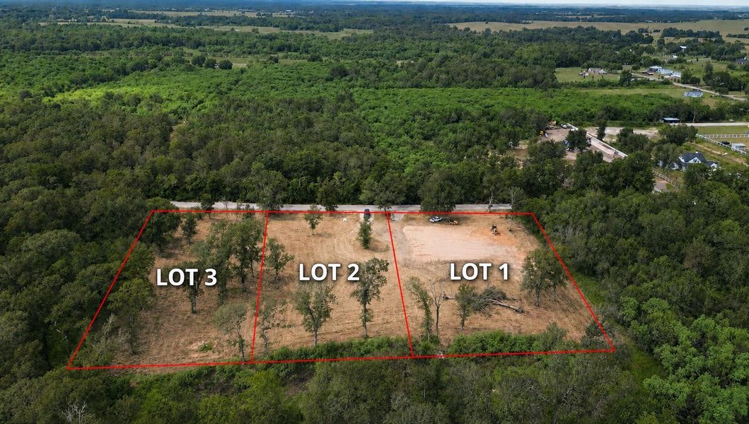 Aerial view showing the three surveyed tracts: Lot 3 – 1.000 acre, Lot 2 – 1.000 acre, and Lot 1 – 1.3082 acres. Red lines are approximate; refer to the recorded survey for exact boundaries and dimensions.