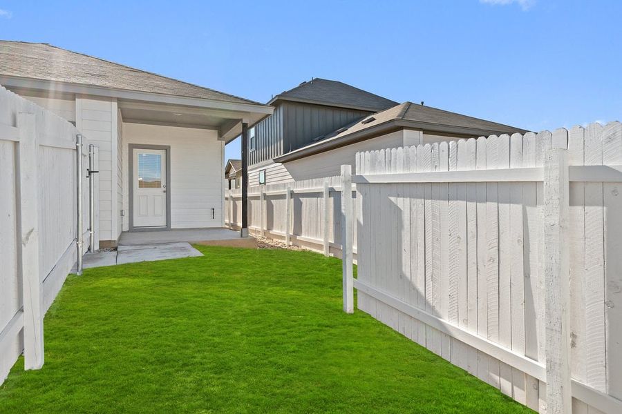 Exterior details and patio area of a home in Porter Country, Kyle (Image 8).