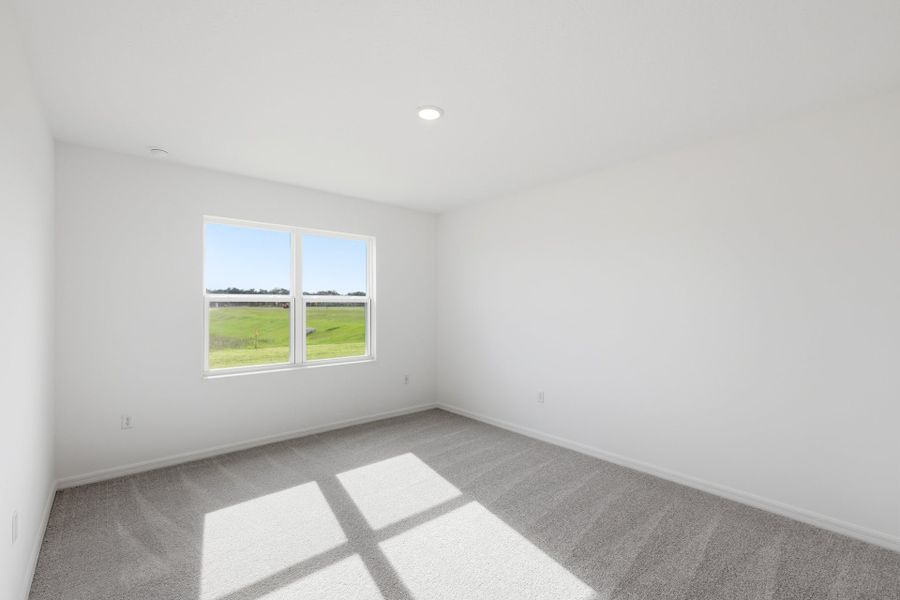 Spacious, unfurnished interior of a new home in Highfield at Twisted Oaks, Wildwood (Image 12).