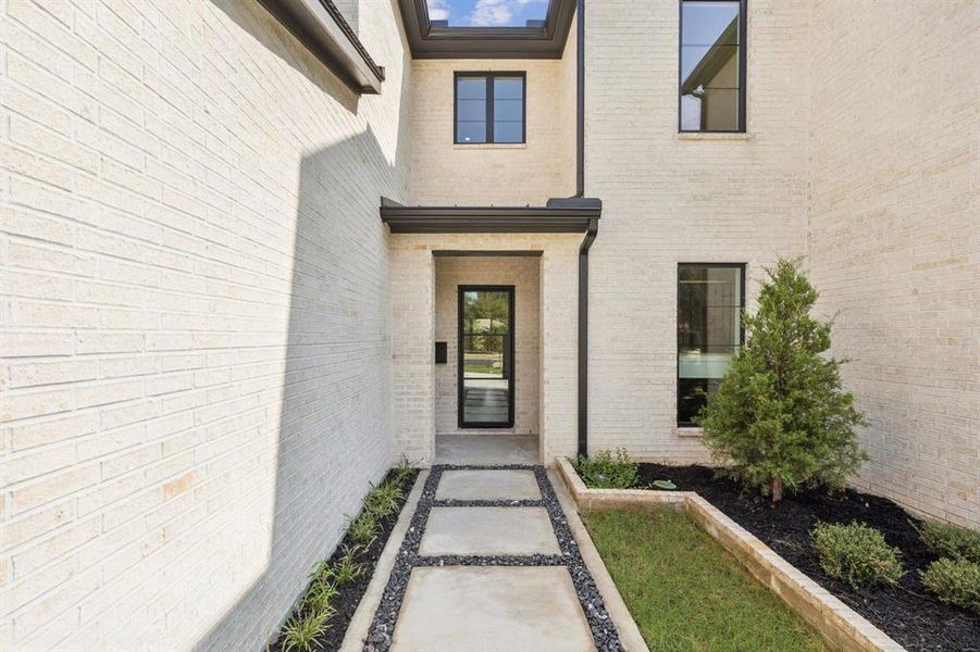 Front exterior of a new home in , Dallas, TX, highlighting curb appeal (Image 2).