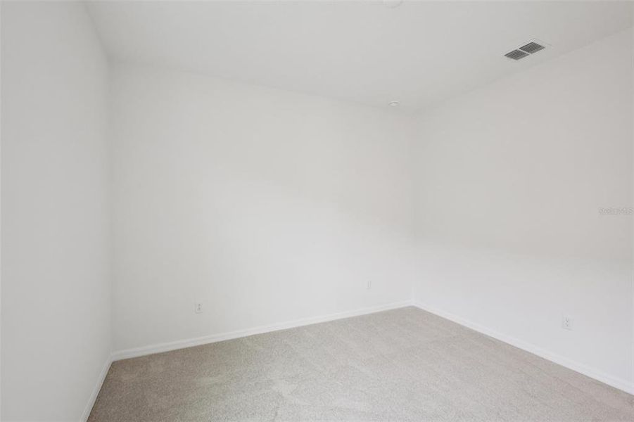 Spacious, unfurnished interior of a new home in Primrose at Longleaf, New Port Richey (Image 24).