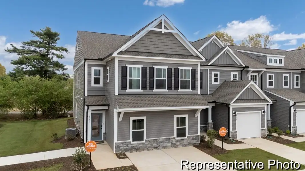 Front exterior of a new home in Covington Ridge Townhomes, Thomasville, NC, highlighting curb appeal (Image 1). Front exterior of a new home in Covington Ridge Townhomes, Thomasville, NC, highlighting curb appeal (Image 1).