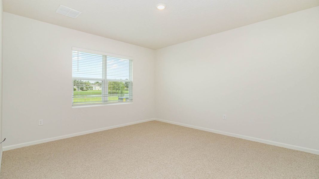 Spacious, unfurnished interior of a new home in Cypress Bay West, Palm Bay (Image 15).