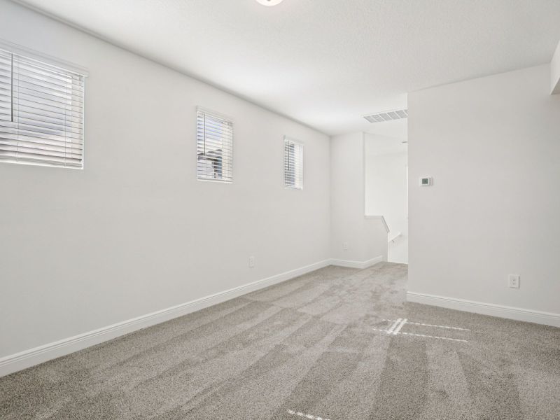 Spacious, unfurnished interior of a new home in Cyrene at Minneola - Villas, Minneola (Image 11).