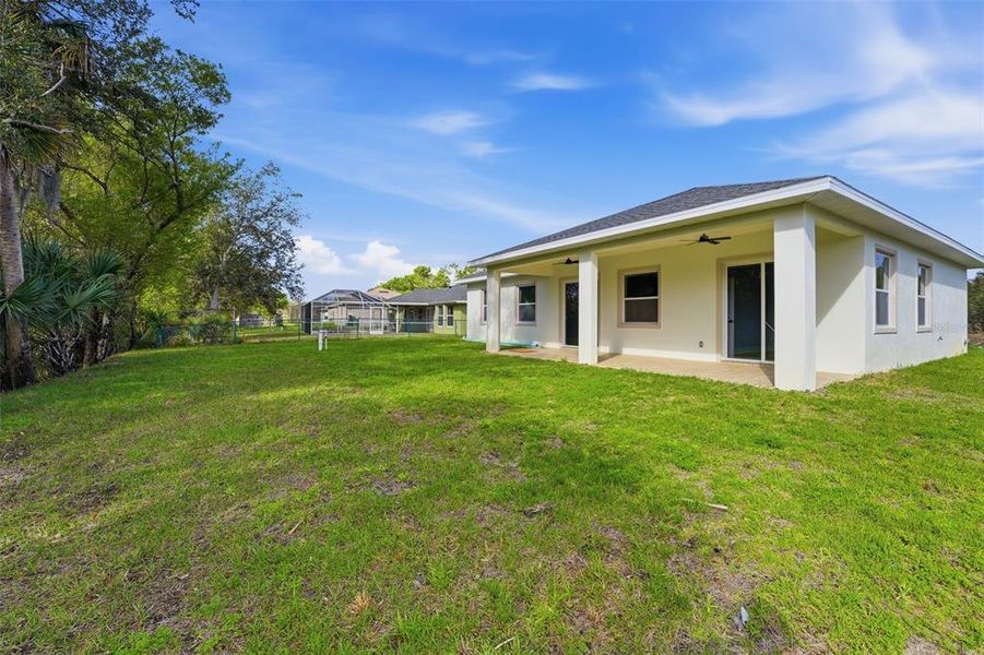 Exterior details and patio area of a home in , North Port (Image 18).