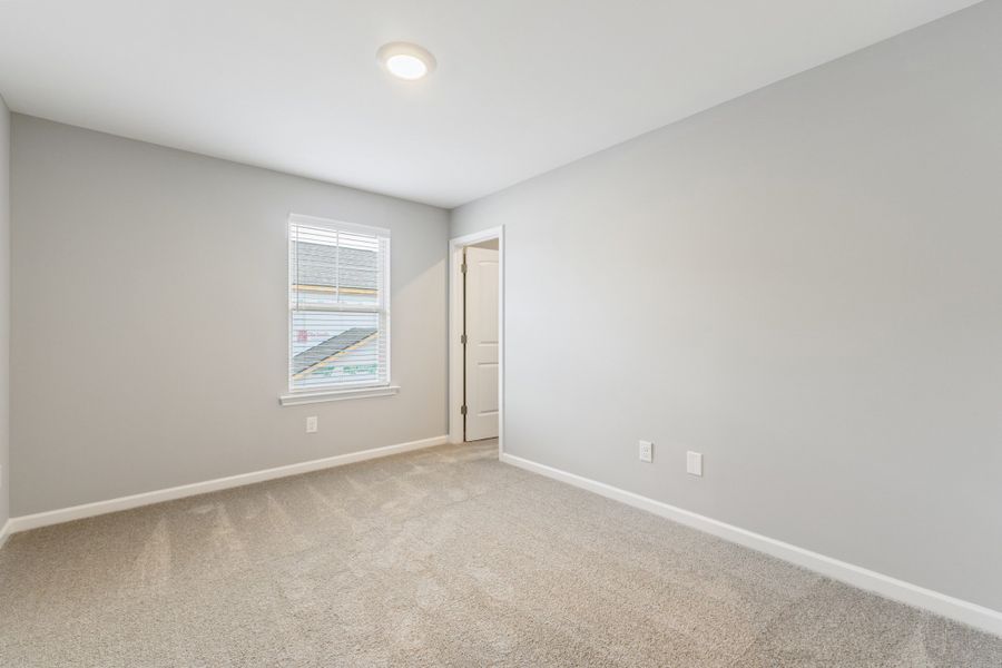 Spacious, unfurnished interior of a new home in Stonehenge, Manchester (Image 21).