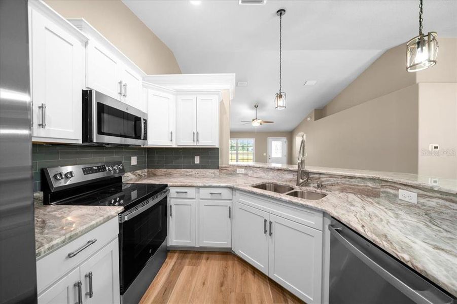 Furnished interior view inside a new home in , Dunnellon (Image 8).