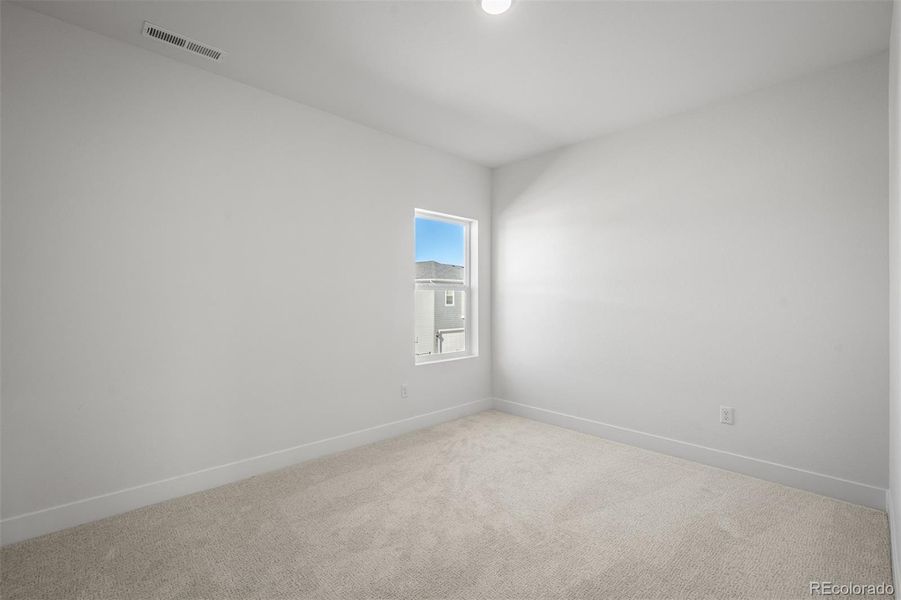 Spacious, unfurnished interior of a new home in Revel Crossing at Wolf Ranch – The Outlook Collection, Colorado Springs (Image 22).