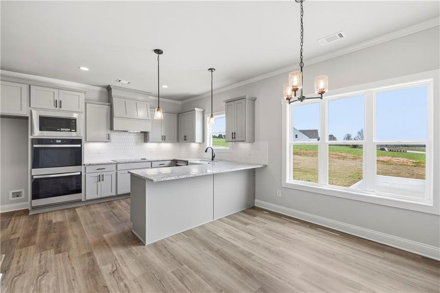 Furnished interior view inside a new home in , Monroe (Image 6).