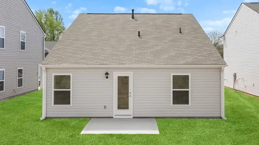 Exterior details and patio area of a home in Village Grove, Greenville (Image 3).