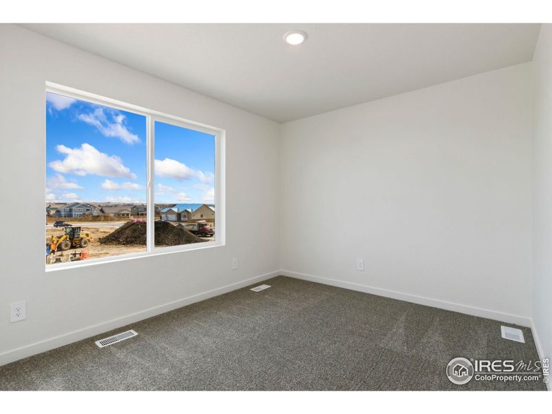 Spacious, unfurnished interior of a new home in Sage Meadows, Wellington (Image 10).