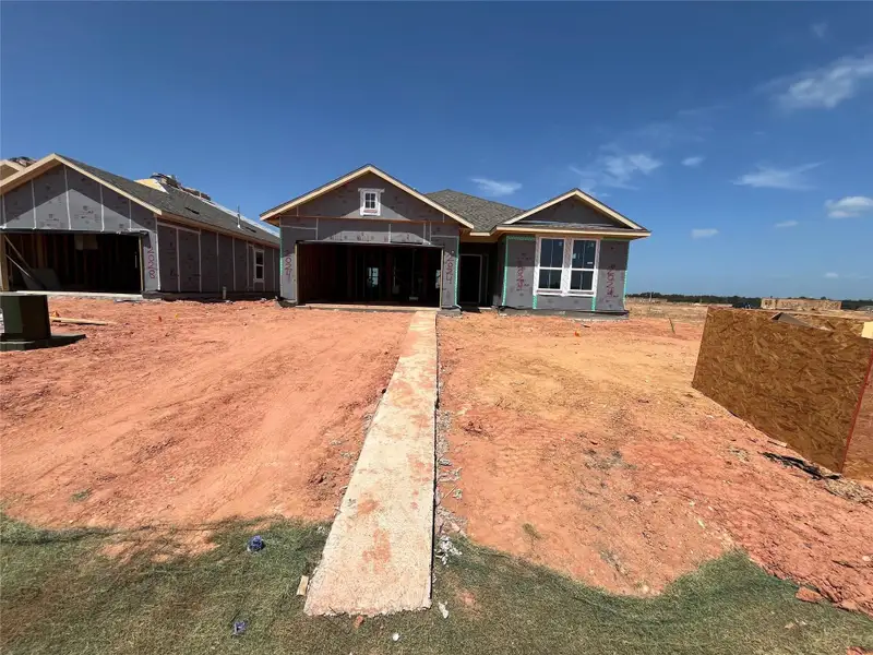 In-progress construction of a new home in Grand Magnolia, Waller, TX (Image 3).
