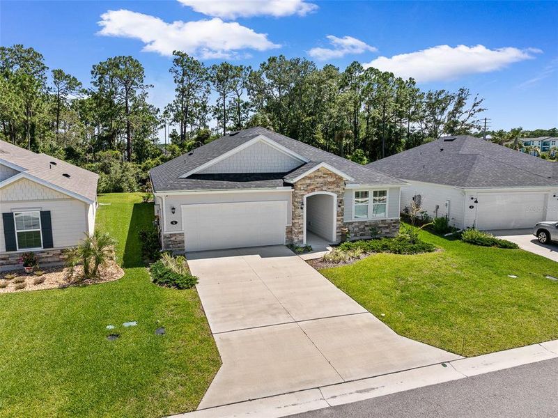 Front exterior of a new home in , Flagler Beach, FL, highlighting curb appeal (Image 26).