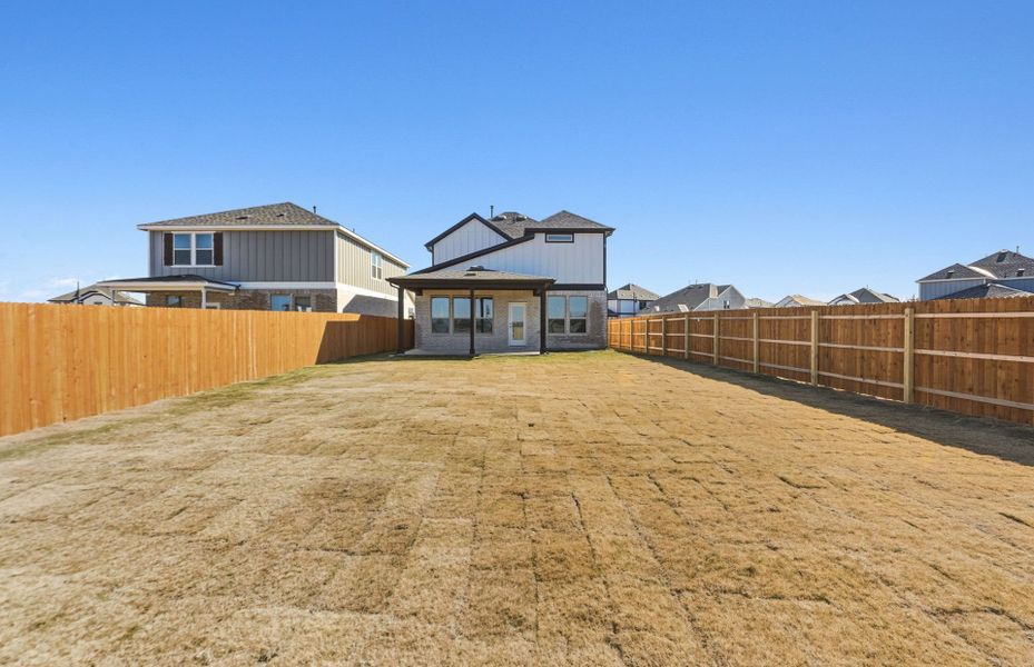 Exterior details and patio area of a home in Santa Rita Ranch, Liberty Hill (Image 22).
