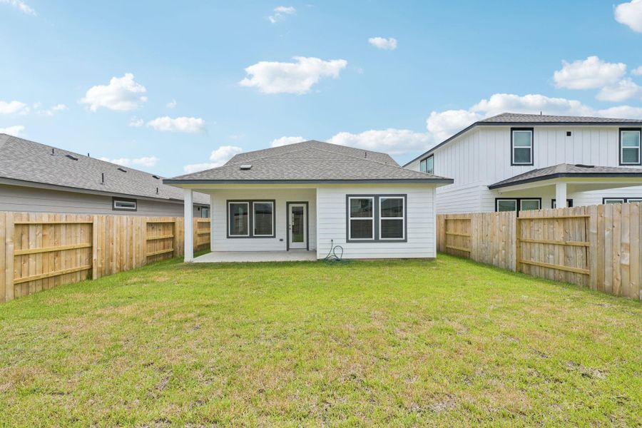 Front exterior of a new home in Mavera, Conroe, TX, highlighting curb appeal (Image 18). Front exterior of a new home in Mavera, Conroe, TX, highlighting curb appeal (Image 18).