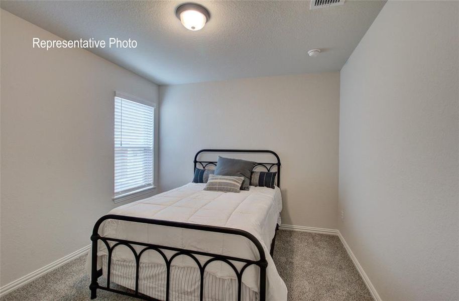 Bedroom featuring carpet flooring