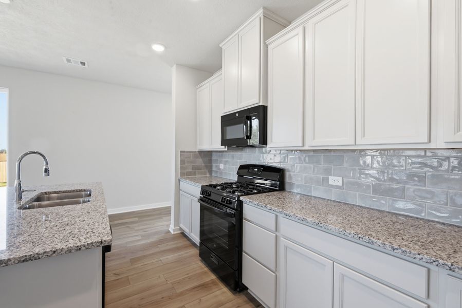 Furnished interior view inside a new home in Heartland at Creek Meadows, College Station (Image 5).