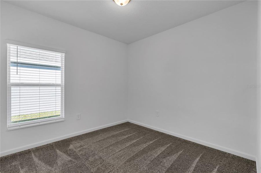 Spacious, unfurnished interior of a new home in Knightsbridge, Kissimmee (Image 23).