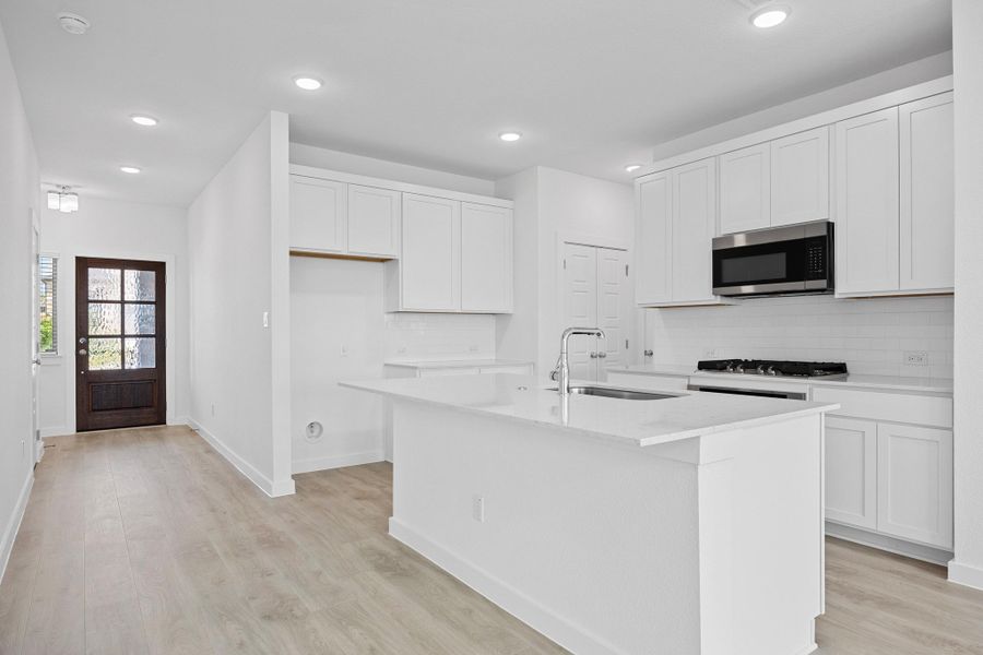 Furnished interior view inside a new home in Lakeside at Tessera, Lago Vista (Image 8).
