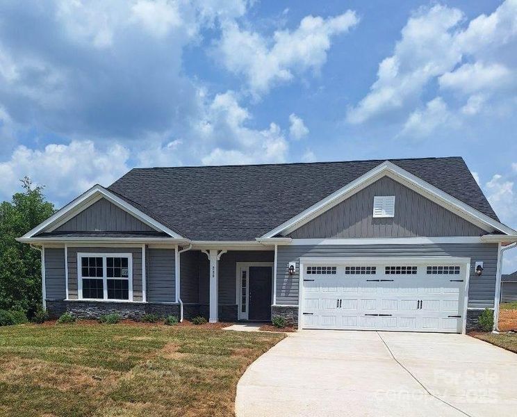 Front exterior of a new home in Northlake, Statesville, NC, highlighting curb appeal (Image 1). Front exterior of a new home in Northlake, Statesville, NC, highlighting curb appeal (Image 1).