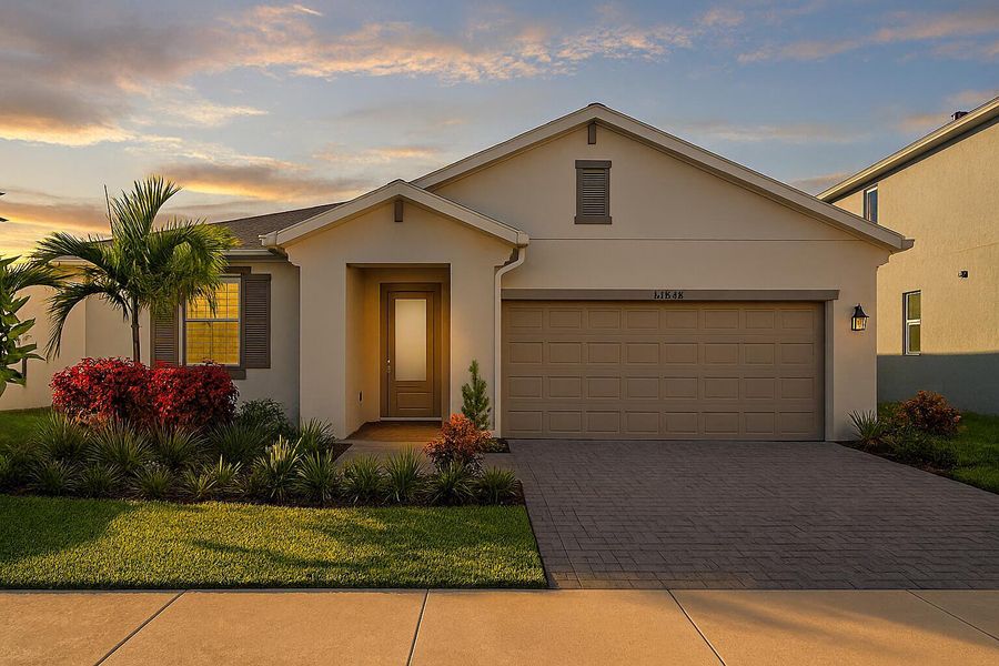 Front exterior of a new home in Tradition - Cadence, Port St. Lucie, FL, highlighting curb appeal (Image 2).