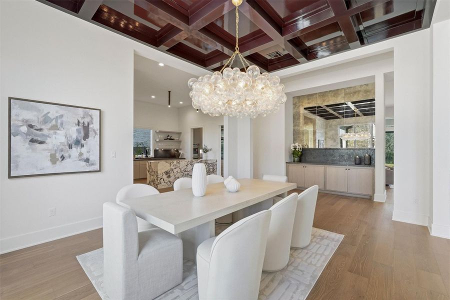 Across from the formal dining is a custom hospitality bar, supporting a seamless flow for entertaining. Across from the formal dining is a custom hospitality bar, supporting a seamless flow for entertaining.