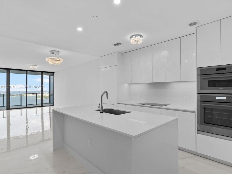Furnished interior view inside a new home in Aria Reserve, Miami (Image 11).