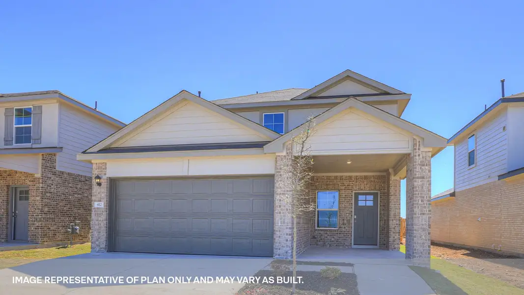 Front exterior of a new home in Whisper South, San Marcos, TX, highlighting curb appeal (Image 2). Front exterior of a new home in Whisper South, San Marcos, TX, highlighting curb appeal (Image 2).