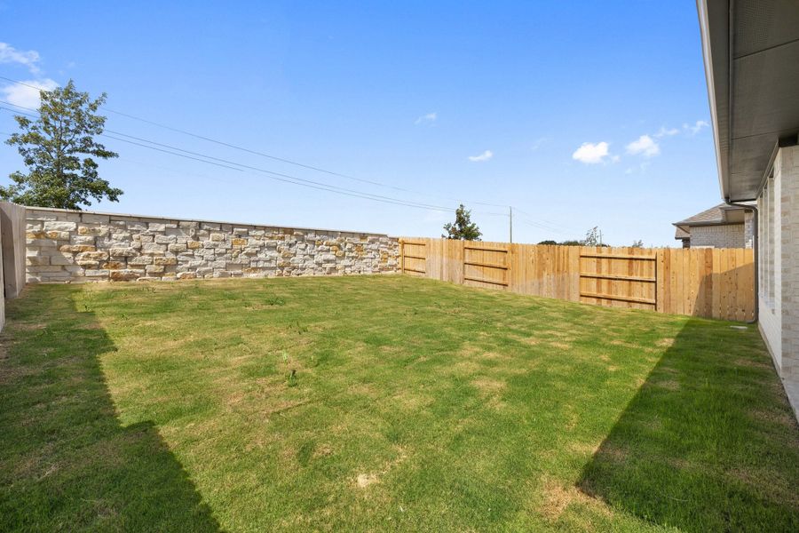 Exterior details and patio area of a home in Flora, Hutto (Image 28).
