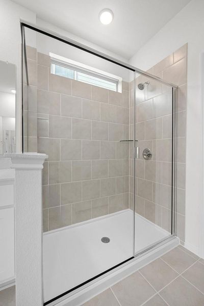 Primary Bath in the Magnolia home plan by Trophy Signature Homes – REPRESENTATIVE PHOTO