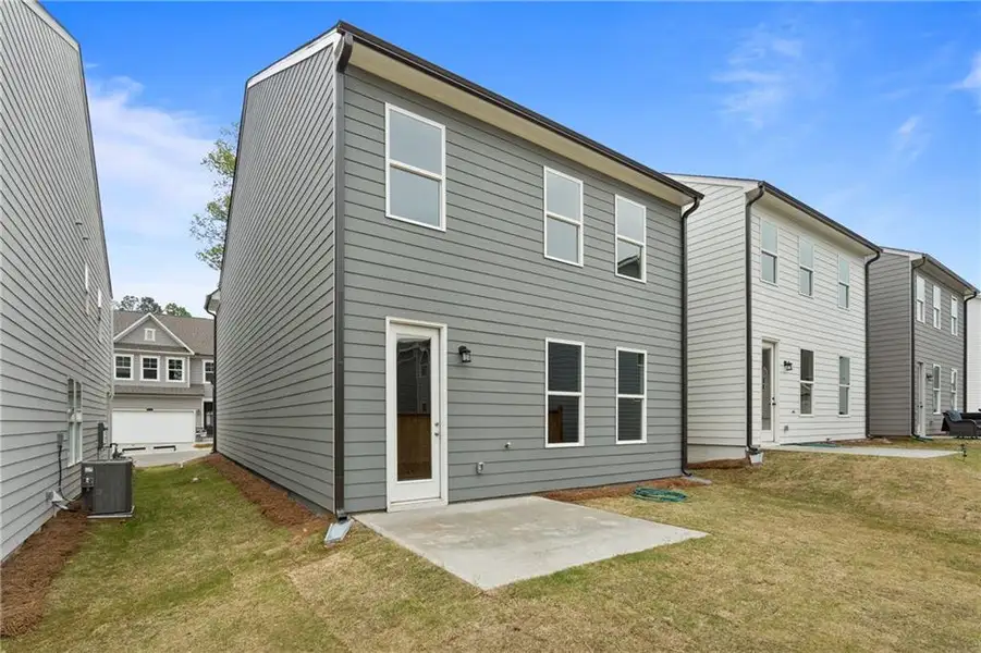 Exterior details and patio area of a home in The Village at Shallowford, Kennesaw (Image 3).