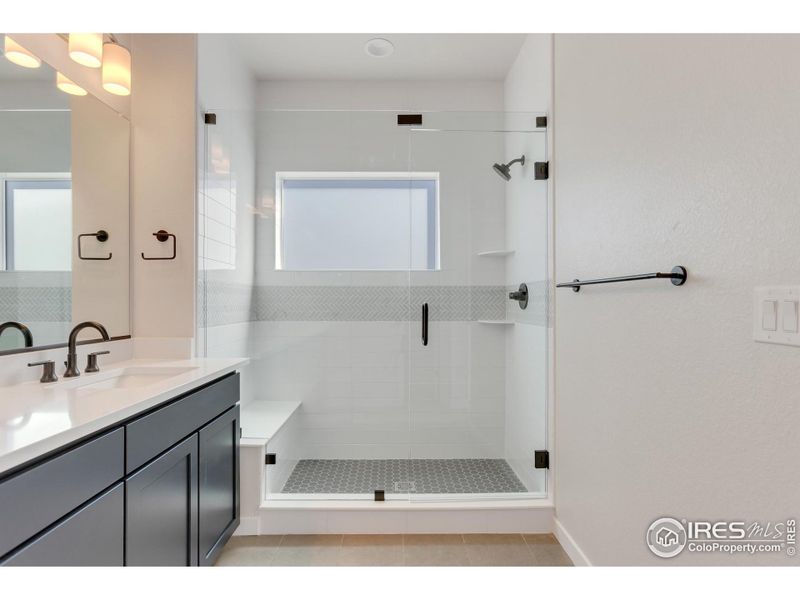 Primary Bathroom w/ Upgraded Tile and Countertops