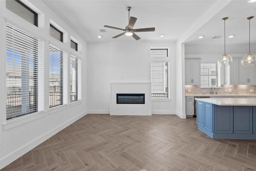 The highlight of this gorgeous Great Room is the fireplace, providing a safe, low-maintenance, and eco-friendly alternative to traditional wood-burning or gas units. The highlight of this gorgeous Great Room is the fireplace, providing a safe, low-maintenance, and eco-friendly alternative to traditional wood-burning or gas units.