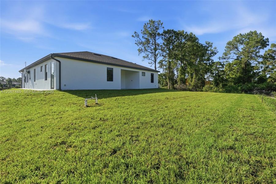 Exterior details and patio area of a home in , Lehigh Acres (Image 21). Exterior details and patio area of a home in , Lehigh Acres (Image 21).