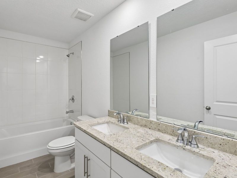 Furnished interior view inside a new home in The District at Oakleaf - The Commons, Middleburg (Image 7).