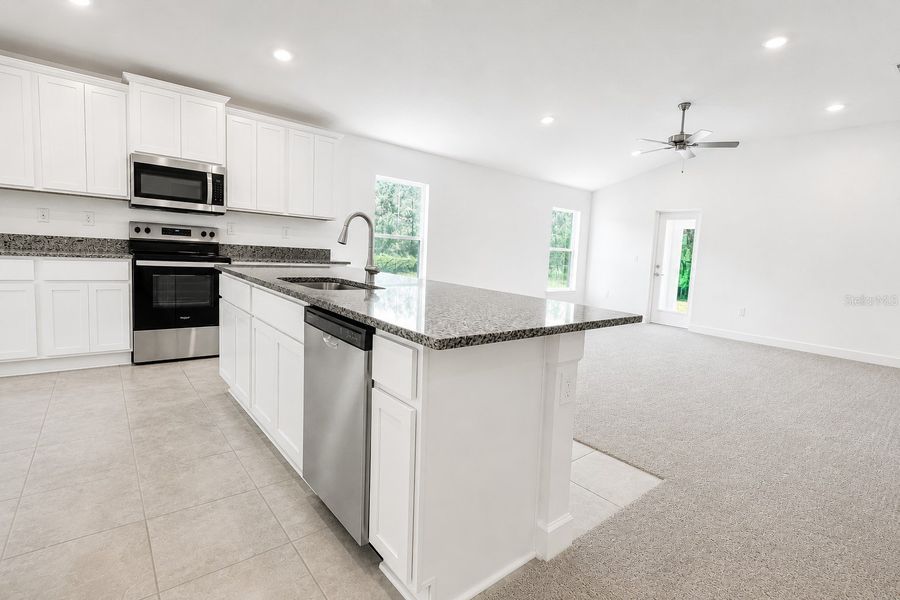 Furnished interior view inside a new home in Harmony Central, St. Cloud (Image 6).