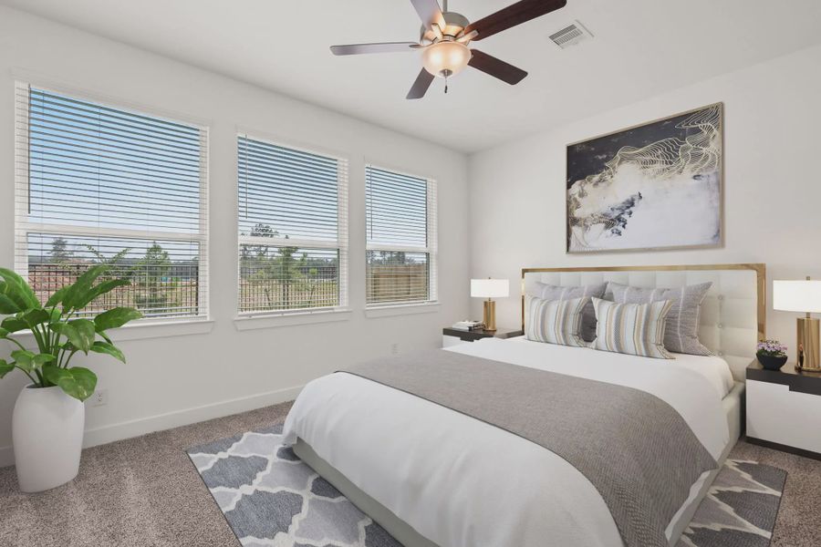 Representative furnished interior of a home built from the Marion by Chesmar Homes in Sunterra, Katy (Image 17).